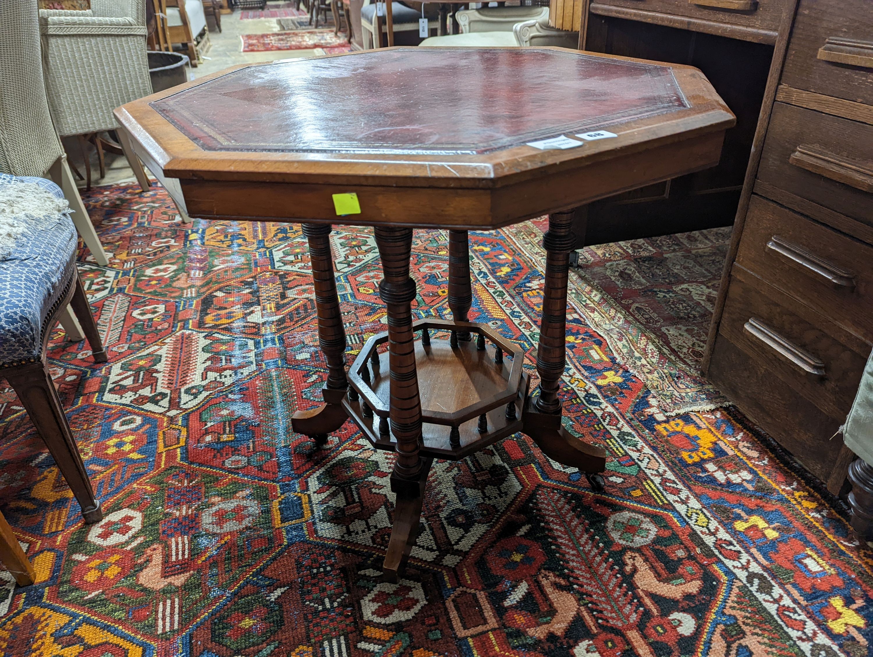 A late Victorian walnut octagonal centre table, width 70cm, height 66cm